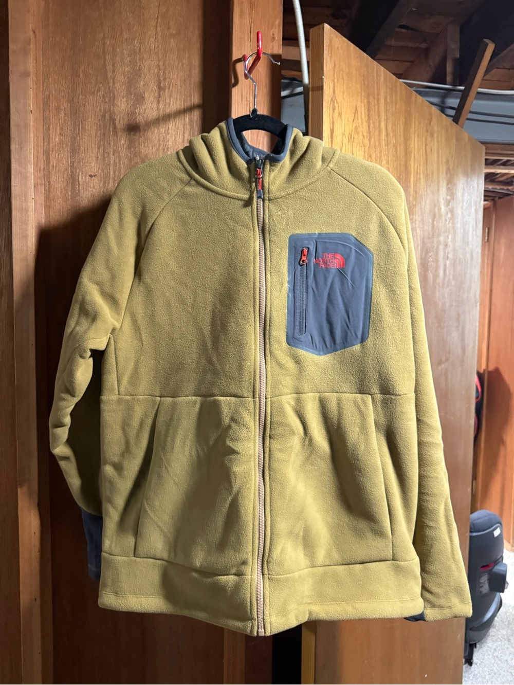 The North Face Olive Green Fleece Jacket with Gray Chest Pocket and Red Logo
